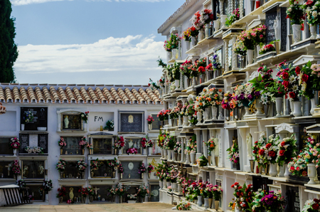COMARES, SPAIN - 28 JUNE 2018 characteristic of the Spanish burial site in the walls, typical graves in the region of Andalusia, Christianityのeditorial素材