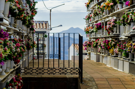 COMARES, SPAIN - 28 JUNE 2018 characteristic of the Spanish burial site in the walls, typical graves in the region of Andalusia, Christianityのeditorial素材