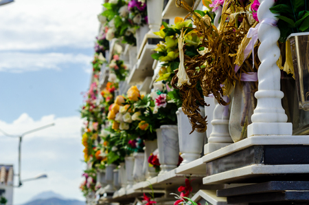 COMARES, SPAIN - 28 JUNE 2018 characteristic of the Spanish burial site in the walls, typical graves in the region of Andalusia, Christianityのeditorial素材