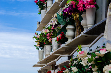 COMARES, SPAIN - 28 JUNE 2018 characteristic of the Spanish burial site in the walls, typical graves in the region of Andalusia, Christianityのeditorial素材