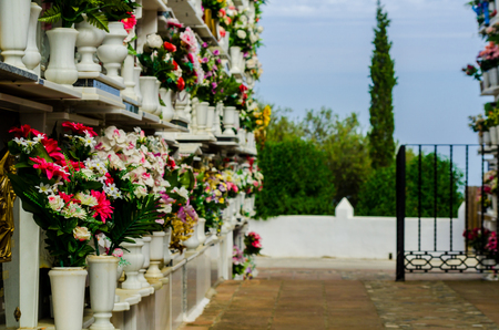 COMARES, SPAIN - 28 JUNE 2018 characteristic of the Spanish burial site in the walls, typical graves in the region of Andalusia, Christianityのeditorial素材