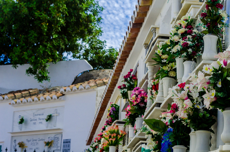 COMARES, SPAIN - 28 JUNE 2018 characteristic of the Spanish burial site in the walls, typical graves in the region of Andalusia, Christianityのeditorial素材