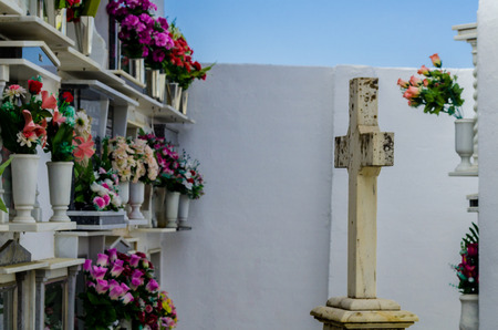 COMARES, SPAIN - 28 JUNE 2018 characteristic of the Spanish burial site in the walls, typical graves in the region of Andalusia, Christianityのeditorial素材
