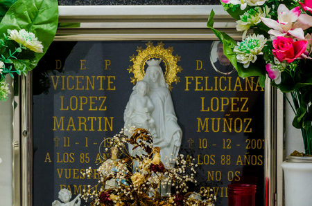 COMARES, SPAIN - 28 JUNE 2018 characteristic of the Spanish burial site in the walls, typical graves in the region of Andalusia, Christianityのeditorial素材