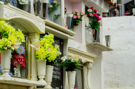 COMARES, SPAIN - 28 JUNE 2018 characteristic of the Spanish burial site in the walls, typical graves in the region of Andalusia, Christianityのeditorial素材