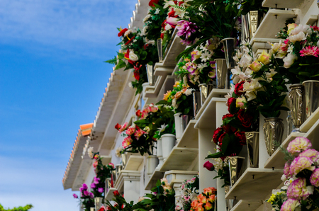 COMARES, SPAIN - 28 JUNE 2018 characteristic of the Spanish burial site in the walls, typical graves in the region of Andalusia, Christianityのeditorial素材