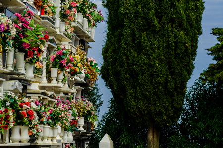COMARES, SPAIN - 28 JUNE 2018 characteristic of the Spanish burial site in the walls, typical graves in the region of Andalusia, Christianityのeditorial素材