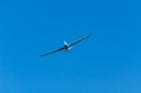 TORRE DEL MAR, SPAIN - JULY 27, 2018 planes flying over the beach in a seaside town, aerobatics airshow in Andalusiaのeditorial素材