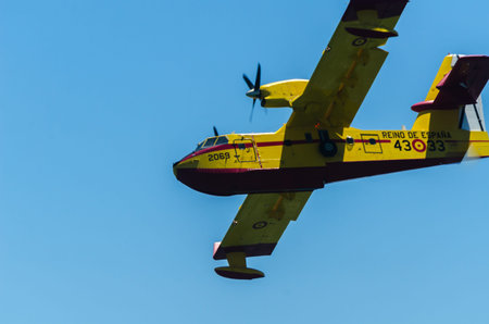 TORRE DEL MAR, SPAIN - JULY 29, 2018 planes flying over the beach in a seaside town, aerobatics...