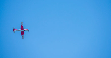 TORRE DEL MAR, SPAIN - JULY 27, 2018 planes flying over the beach in a seaside town, aerobatics...