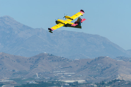 TORRE DEL MAR, SPAIN - JULY 29, 2018 planes flying over the beach in a seaside town, aerobatics airshow in Andalusiaのeditorial素材