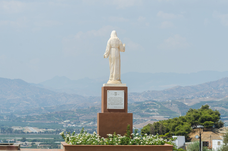 VELEZ-MALAGA, SPAIN - AUGUST 24, 2018 Plants and  trees in the park in a Spanish city, characteristic architecture in the south of Spainのeditorial素材