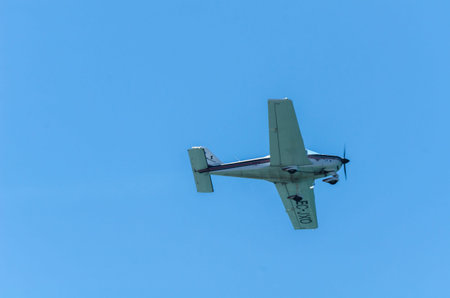 TORRE DEL MAR, SPAIN - JULY 29, 2018 planes flying over the beach in a seaside town, aerobatics...