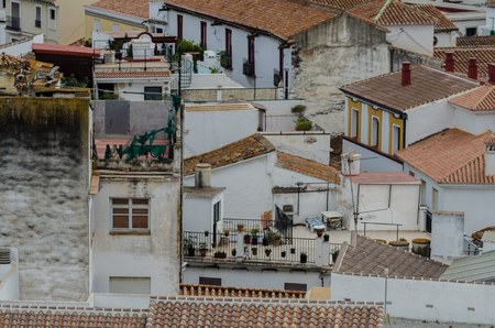 VELEZ-MALAGA, SPAIN - AUGUST 17, 2018 roofs and facades of buildings in a Spanish city, characteristic architecture in the south of Spainのeditorial素材