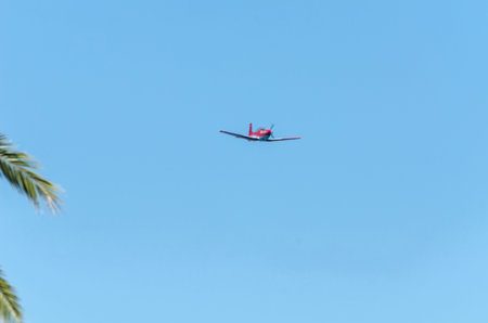 TORRE DEL MAR, SPAIN - JULY 27, 2018 planes flying over the beach in a seaside town, aerobatics...