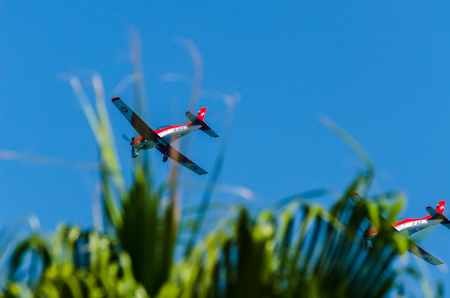 TORRE DEL MAR, SPAIN - JULY 27, 2018 planes flying over the beach in a seaside town, aerobatics airshow in Andalusiaのeditorial素材