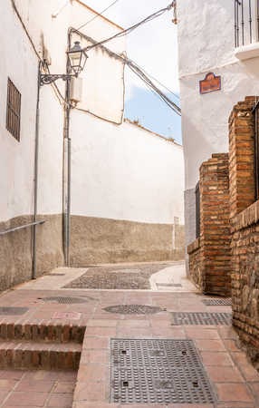VELEZ-MALAGA, SPAIN - AUGUST 17, 2018 Empty streets during a siesta in a Spanish city, characteristic architecture in the south of Spainのeditorial素材