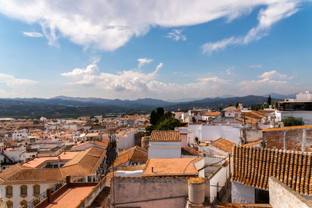 VELEZ-MALAGA, SPAIN - AUGUST 17, 2018 roofs and facades of buildings in a Spanish city, characteristic architecture in the south of Spain