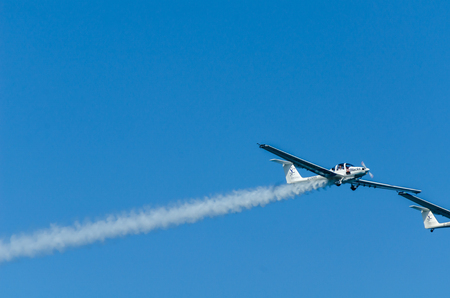 TORRE DEL MAR, SPAIN - JULY 27, 2018 planes flying over the beach in a seaside town, aerobatics airshow in Andalusiaのeditorial素材