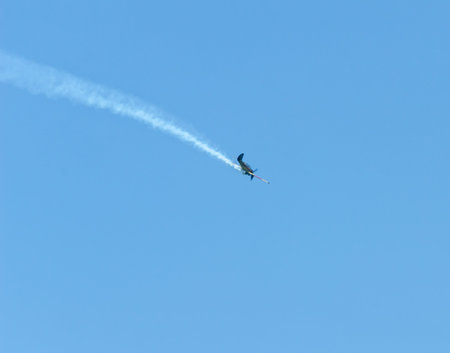 TORRE DEL MAR, SPAIN - JULY 29, 2018 planes flying over the beach in a seaside town, aerobatics...