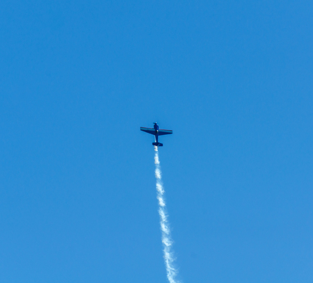 TORRE DEL MAR, SPAIN - JULY 29, 2018 planes flying over the beach in a seaside town, aerobatics airshow in Andalusiaのeditorial素材
