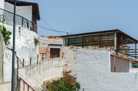 VELEZ-MALAGA, SPAIN - AUGUST 24, 2018 Empty streets during a siesta in a Spanish city, characteristic architecture in the south of Spainのeditorial素材