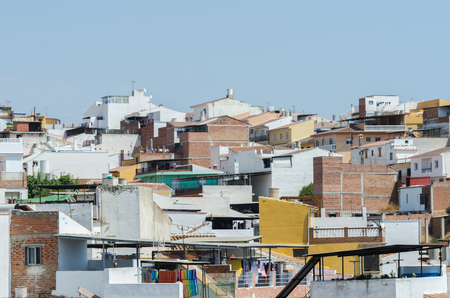 VELEZ-MALAGA, SPAIN - AUGUST 24, 2018 roofs and facades of buildings in a Spanish city, characteristic architecture in the south of Spainのeditorial素材
