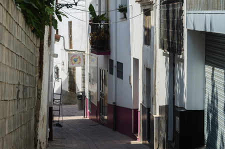 VELEZ-MALAGA, SPAIN - AUGUST 24, 2018 Empty streets during a siesta in a Spanish city, characteristic architecture in the south of Spainのeditorial素材