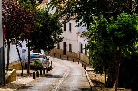 BAENA, SPAIN - SEPTEMBER 12, 2018 Empty Spanish streets in a small town next to Cordoba, the characteristic architecture of old Andalusiaのeditorial素材