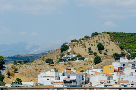 VELEZ-MALAGA, SPAIN - AUGUST 24, 2018 roofs and facades of buildings in a Spanish city, characteristic architecture in the south of Spainのeditorial素材