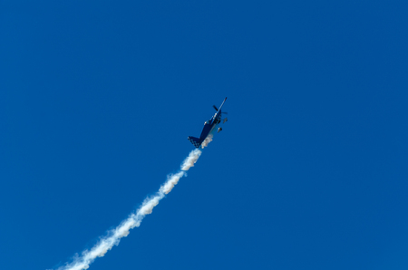 TORRE DEL MAR, SPAIN - JULY 29, 2018 planes flying over the beach in a seaside town, aerobatics airshow in Andalusiaのeditorial素材