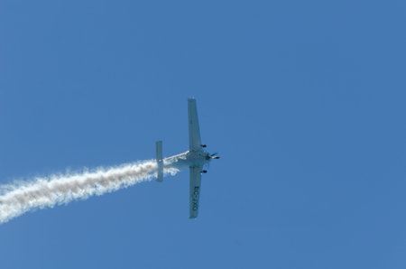 TORRE DEL MAR, SPAIN - JULY 29, 2018 planes flying over the beach in a seaside town, aerobatics...
