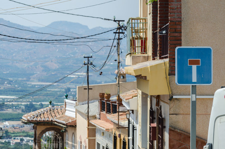VELEZ-MALAGA, SPAIN - AUGUST 24, 2018 Empty streets during a siesta in a Spanish city, characteristic architecture in the south of Spainのeditorial素材