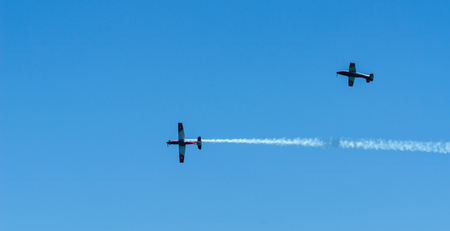TORRE DEL MAR, SPAIN - JULY 29, 2018 planes flying over the beach in a seaside town, aerobatics airshow in Andalusiaのeditorial素材