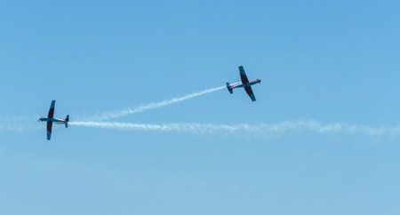 TORRE DEL MAR, SPAIN - JULY 29, 2018 planes flying over the beach in a seaside town, aerobatics airshow in Andalusiaのeditorial素材