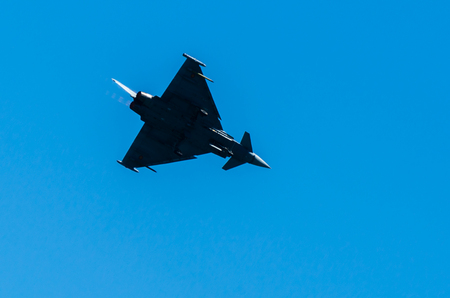 TORRE DEL MAR, SPAIN - JULY 29, 2018 planes flying over the beach in a seaside town, aerobatics airshow in Andalusiaのeditorial素材