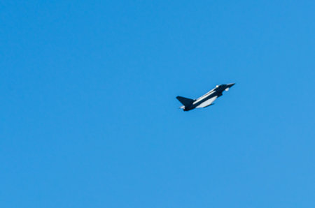 TORRE DEL MAR, SPAIN - JULY 29, 2018 planes flying over the beach in a seaside town, aerobatics...