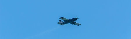 TORRE DEL MAR, SPAIN - JULY 29, 2018 planes flying over the beach in a seaside town, aerobatics...