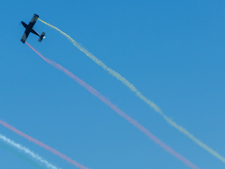 TORRE DEL MAR, SPAIN - JULY 29, 2018 planes flying over the beach in a seaside town, aerobatics airshow in Andalusiaのeditorial素材