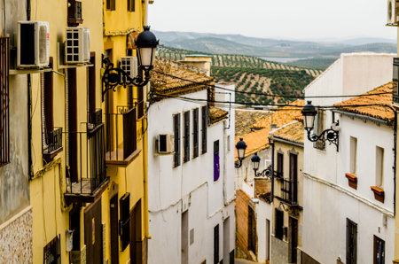 BAENA, SPAIN - SEPTEMBER 12, 2018 Empty Spanish streets in a small town next to Cordoba, the characteristic architecture of old Andalusiaのeditorial素材