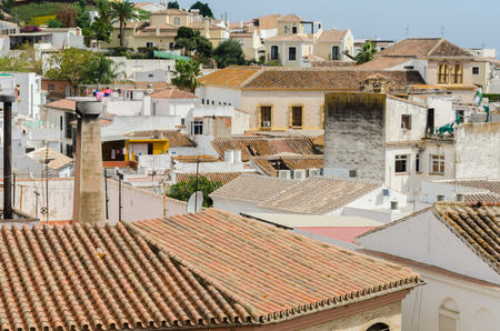 VELEZ-MALAGA, SPAIN - AUGUST 17, 2018 roofs and facades of buildings in a Spanish city, characteristic architecture in the south of Spainのeditorial素材