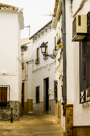 BAENA, SPAIN - SEPTEMBER 12, 2018 Empty Spanish streets in a small town next to Cordoba, the characteristic architecture of old Andalusiaのeditorial素材
