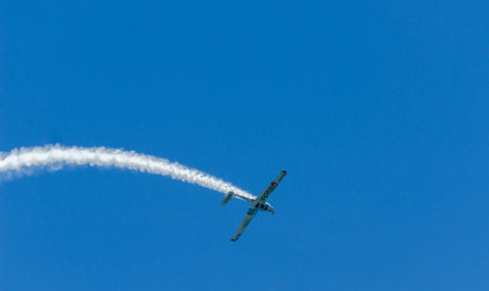 TORRE DEL MAR, SPAIN - JULY 29, 2018 planes flying over the beach in a seaside town, aerobatics...