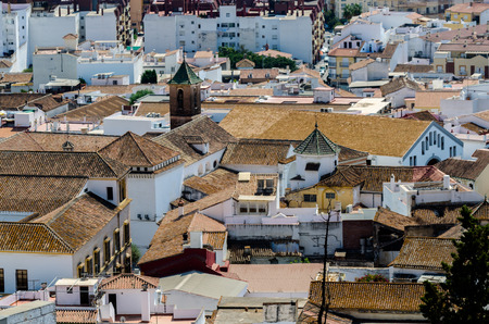 VELEZ-MALAGA, SPAIN - AUGUST 24, 2018 roofs and facades of buildings in a Spanish city, characteristic architecture in the south of Spainのeditorial素材