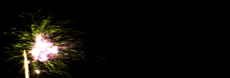Amazing fireworks in the black sky, grand spectacle at the beginning of the new year, party