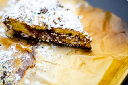 Closeup on a crumb cake stuffed with strawberry marmalade, delicious dessert
