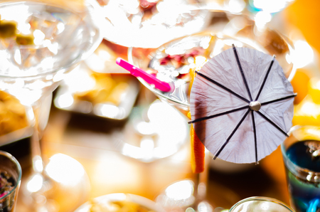 Tasty and colorful drinks based on various alcohols, syrups and liqueurs, unique effect of the bartender's work, party nightの写真素材