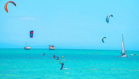 Kitesurfing on the waves of the sea in Spain, watercolor painted, active sportの写真素材