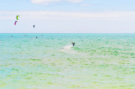 Kitesurfing on the waves of the sea in Spain, watercolor painted, active sportの写真素材