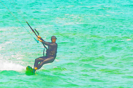 Kitesurfing on the waves of the sea in Spain, watercolor painted, active sportの写真素材